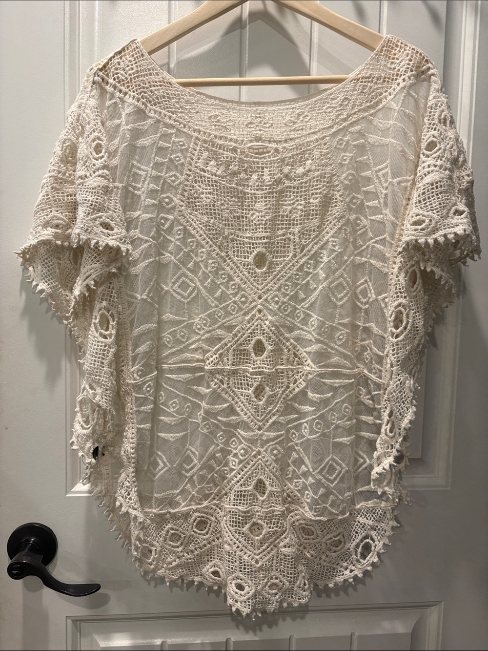 Bohemian crochet lace poncho top wide boat neckline geometric panel detail